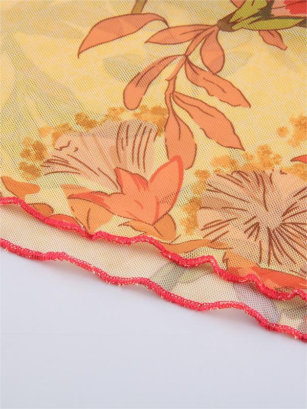 Crop top met bloemenpatroon en halternek van mesh 5