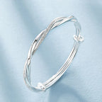 Stijlvolle Gevlochten Zilveren Armband voor Dames Met Uniek Verwarrend Patroon en Tijdloze Elegant Styling in Sterling Zilver