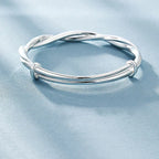 Stijlvolle Gevlochten Zilveren Armband voor Dames Met Uniek Verwarrend Patroon en Tijdloze Elegant Styling in Sterling Zilver