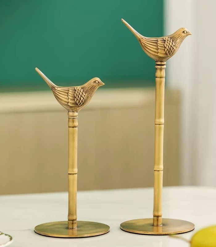 Elegante papieren handdoekhouder van massief messing – charmant vogelontwerp