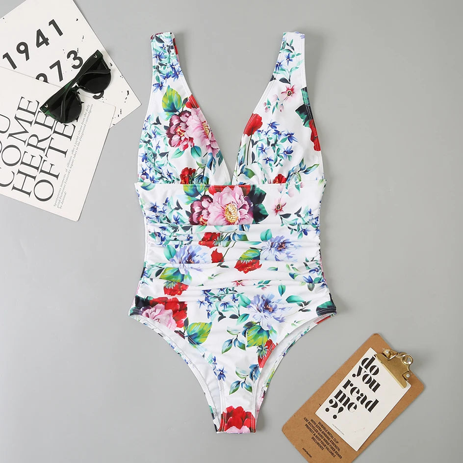 Diepe V-hals One-Piece Badpak voor Vrouwen met Hoge Beenuitsnijding en Flatterend Design voor Strand en Zwembad