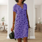 Dames mini-jurk met korte mouwen en bladprint 5
