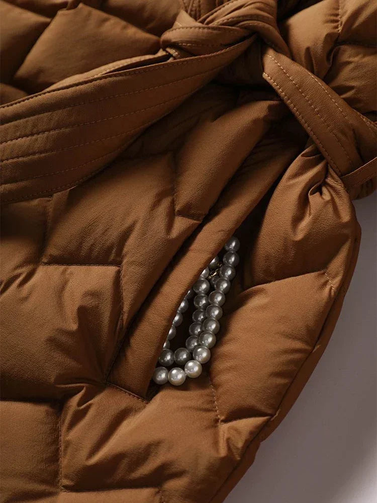 Elegante dames donsjas met riem 4