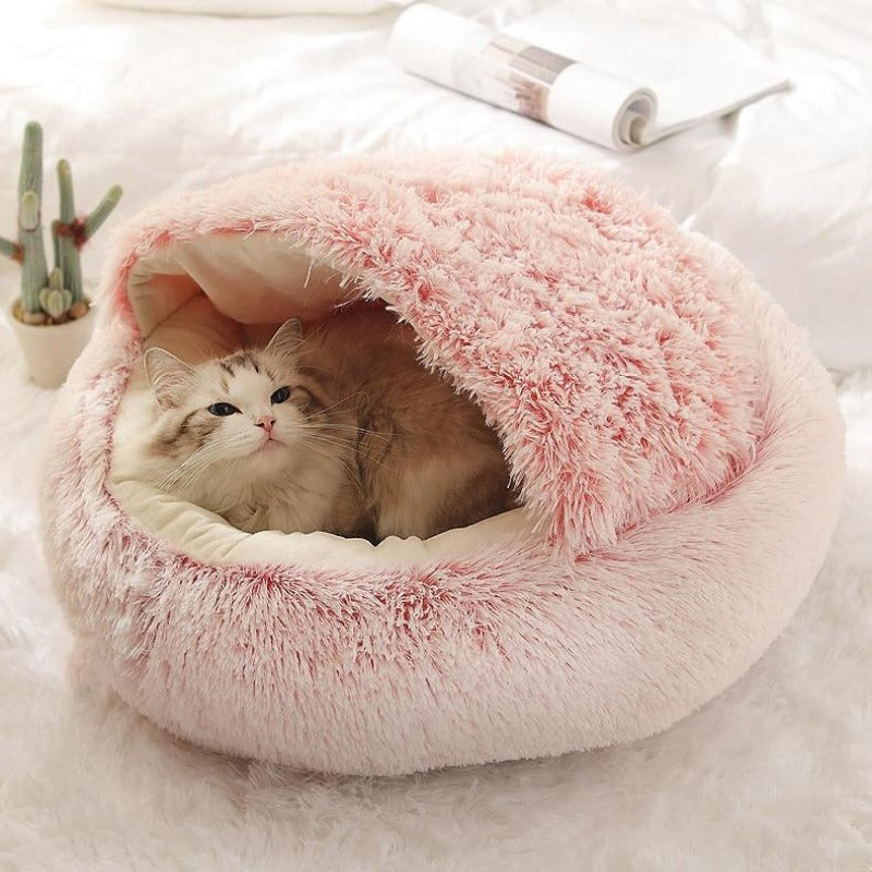 Ronde, rustgevende kattengrot van pluche