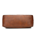 De Belgravia kunstleren vintage schoudertas en etui