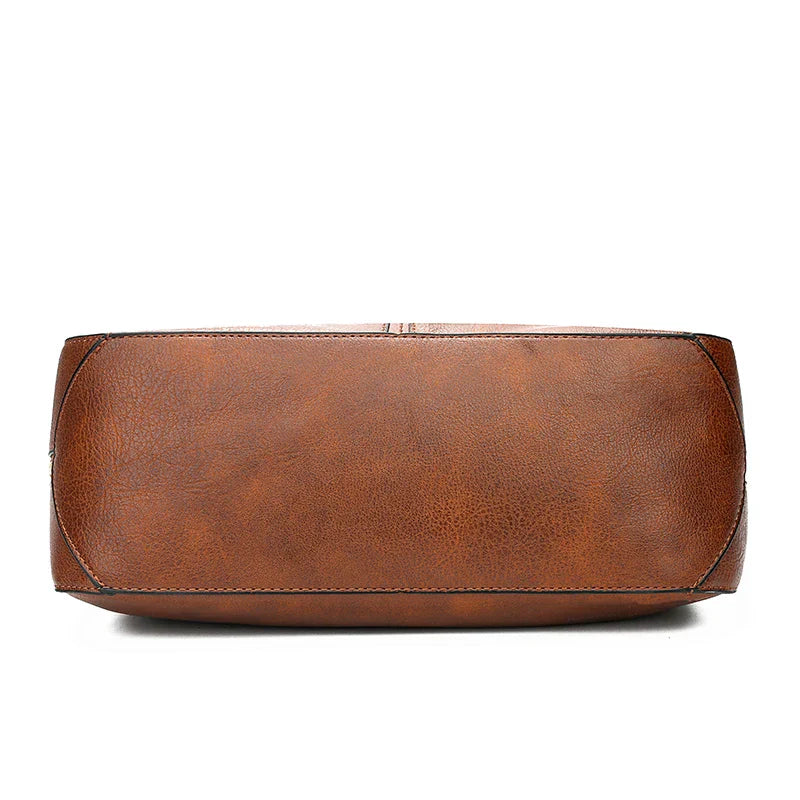 De Belgravia kunstleren vintage schoudertas en etui