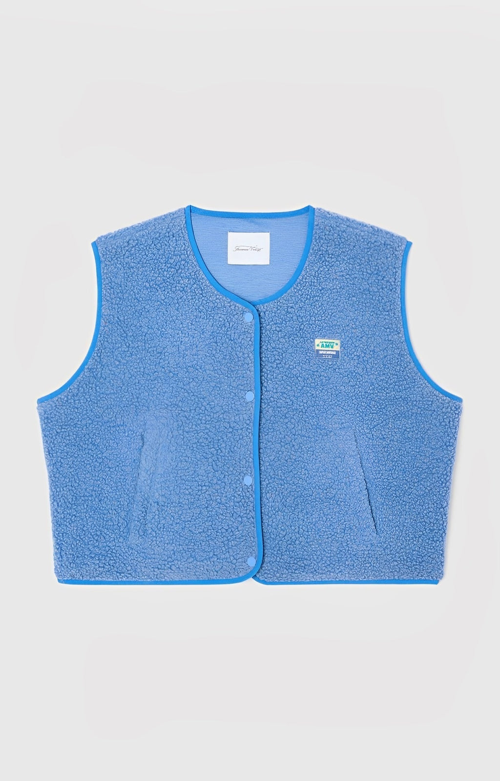 Mouwloos damesvest met drukknopen en ronde hals 6