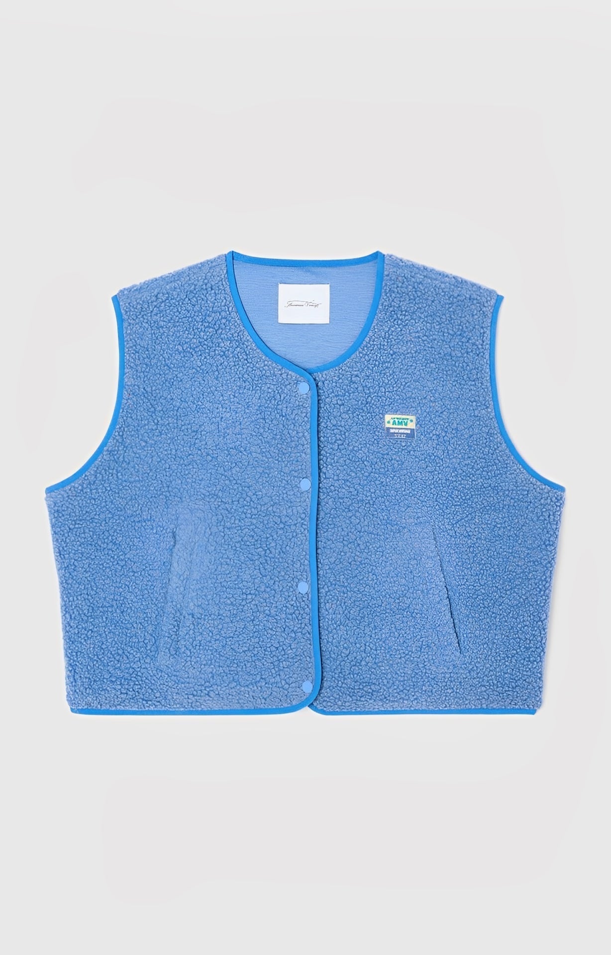 Mouwloos damesvest met drukknopen en ronde hals 6