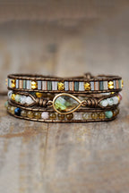 Elegante gelaagde armband met kralen en natuurlijke stenen