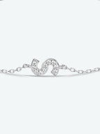 Elegante zirconium en sterling zilveren armband met gouden accenten