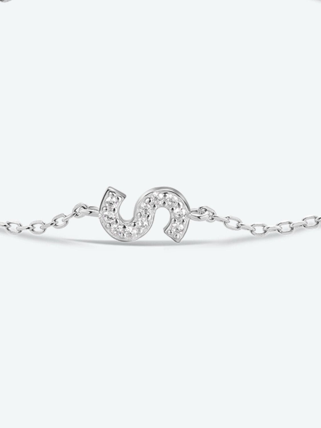 Elegante zirconium en sterling zilveren armband met gouden accenten