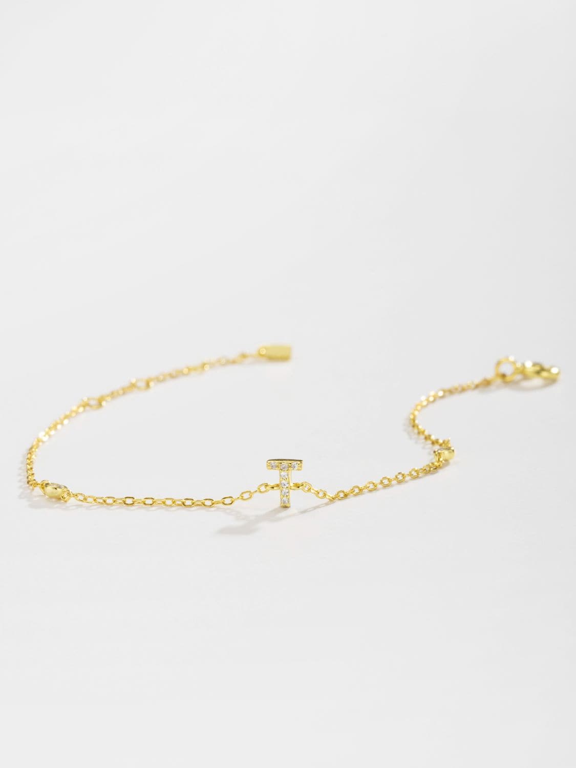 Elegante zirconium en sterling zilveren armband met gouden accenten