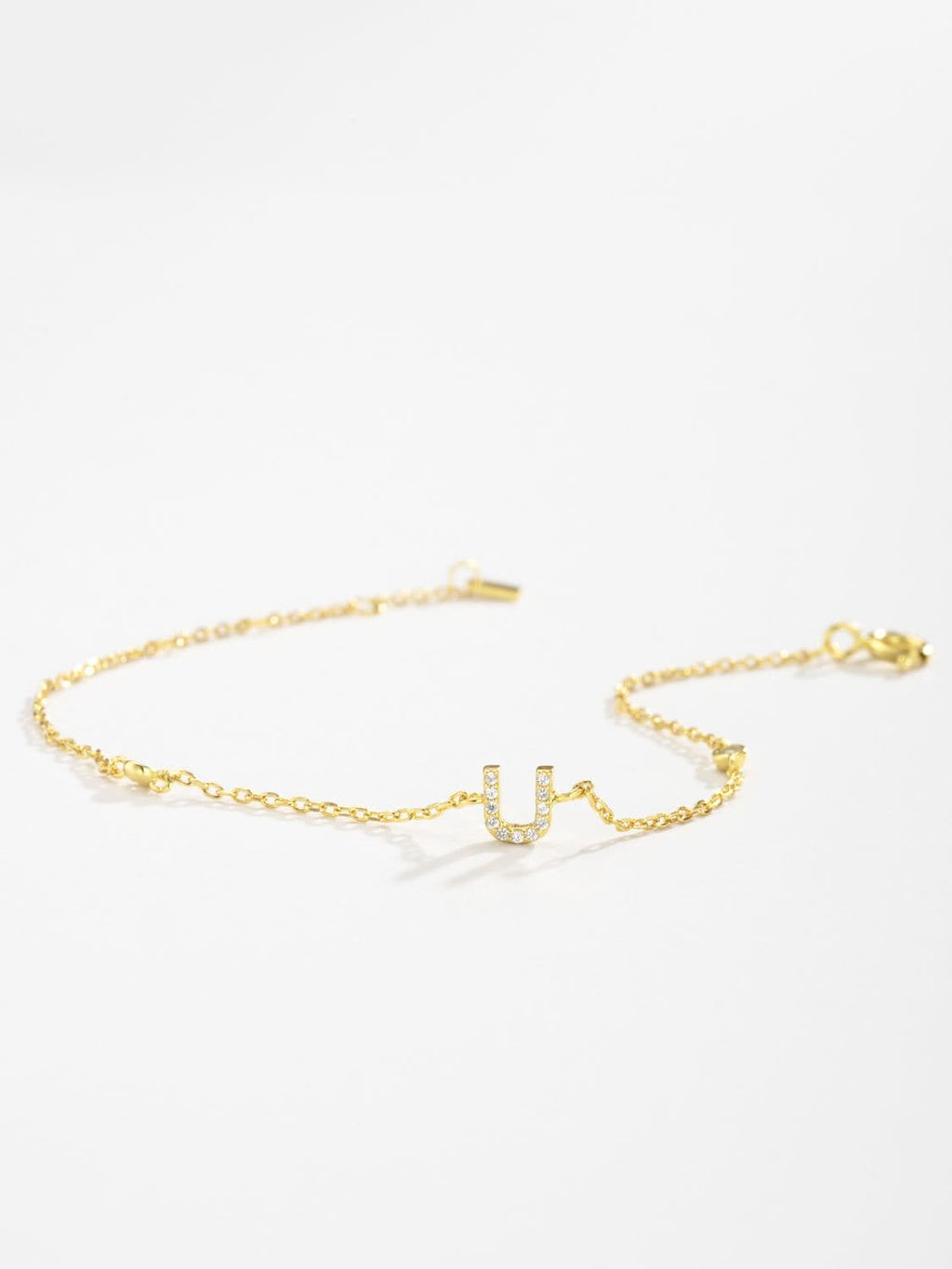 Elegante zirconium en sterling zilveren armband met gouden accenten