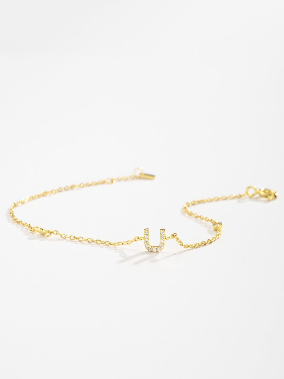 Elegante zirconium en sterling zilveren armband met gouden accenten