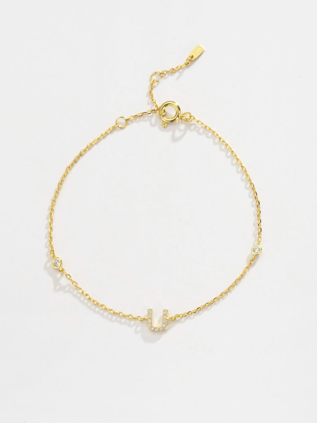 Elegante zirconium en sterling zilveren armband met gouden accenten