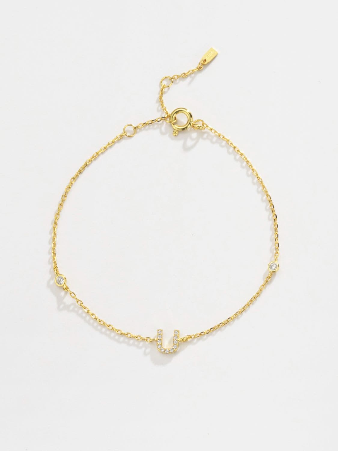 Elegante zirconium en sterling zilveren armband met gouden accenten