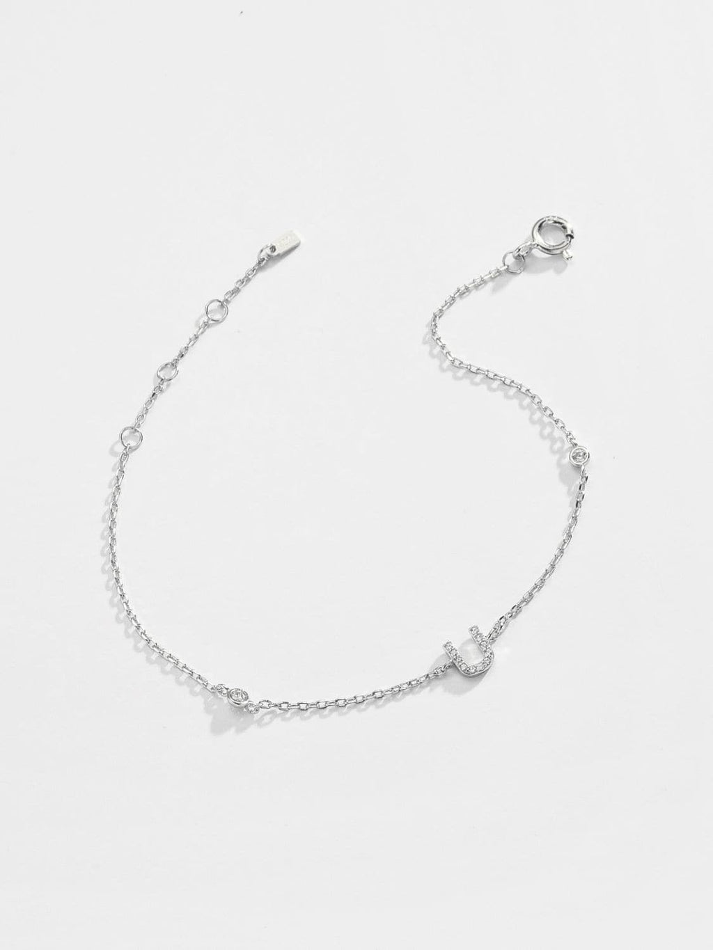 Elegante zirconium en sterling zilveren armband met gouden accenten