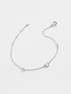 Elegante zirconium en sterling zilveren armband met gouden accenten