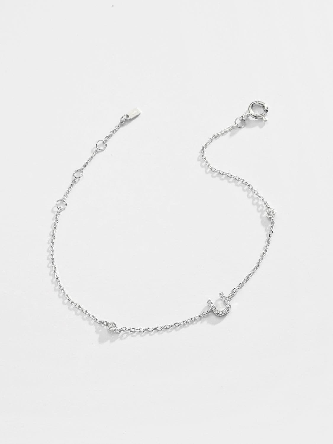 Elegante zirconium en sterling zilveren armband met gouden accenten