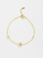 Elegante zirconium en sterling zilveren armband met gouden accenten