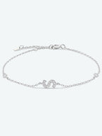 Elegante zirconium en sterling zilveren armband met gouden accenten