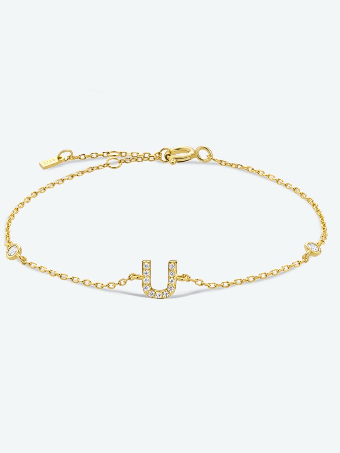 Elegante zirconium en sterling zilveren armband met gouden accenten