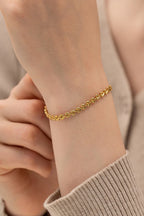 Hartverwarmende armband met bedels en kreeftsluiting
