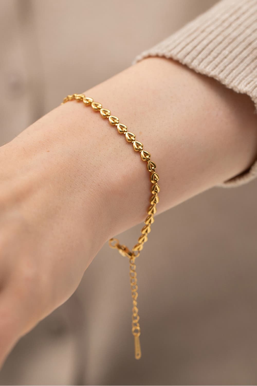 Hartverwarmende armband met bedels en kreeftsluiting