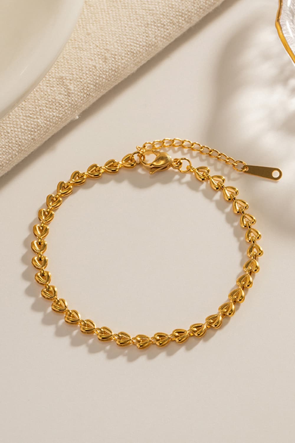 Hartverwarmende armband met bedels en kreeftsluiting