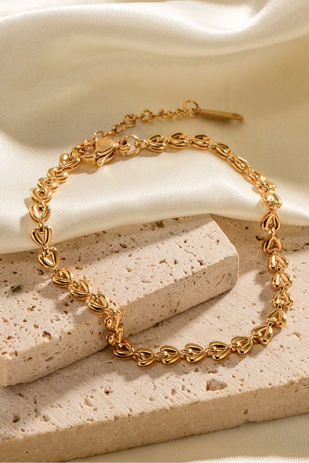 Hartverwarmende armband met bedels en kreeftsluiting