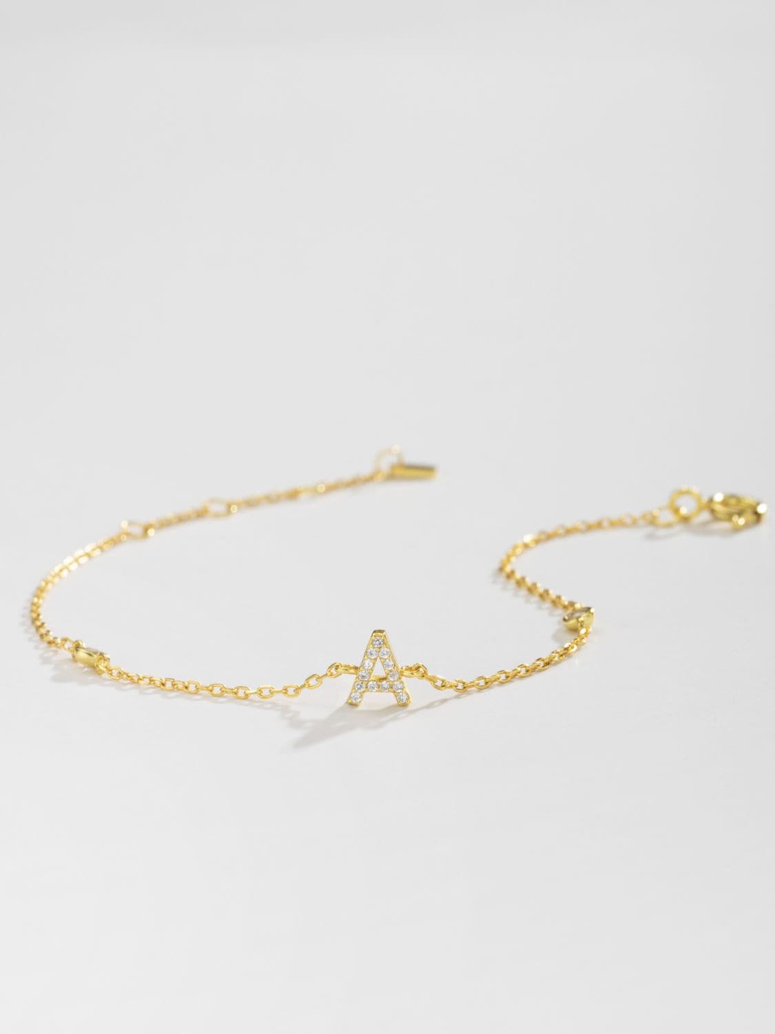 Zircon alfabet bedelarmband in 925 sterling zilver