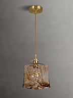 Hanglamp van messing en amberglas