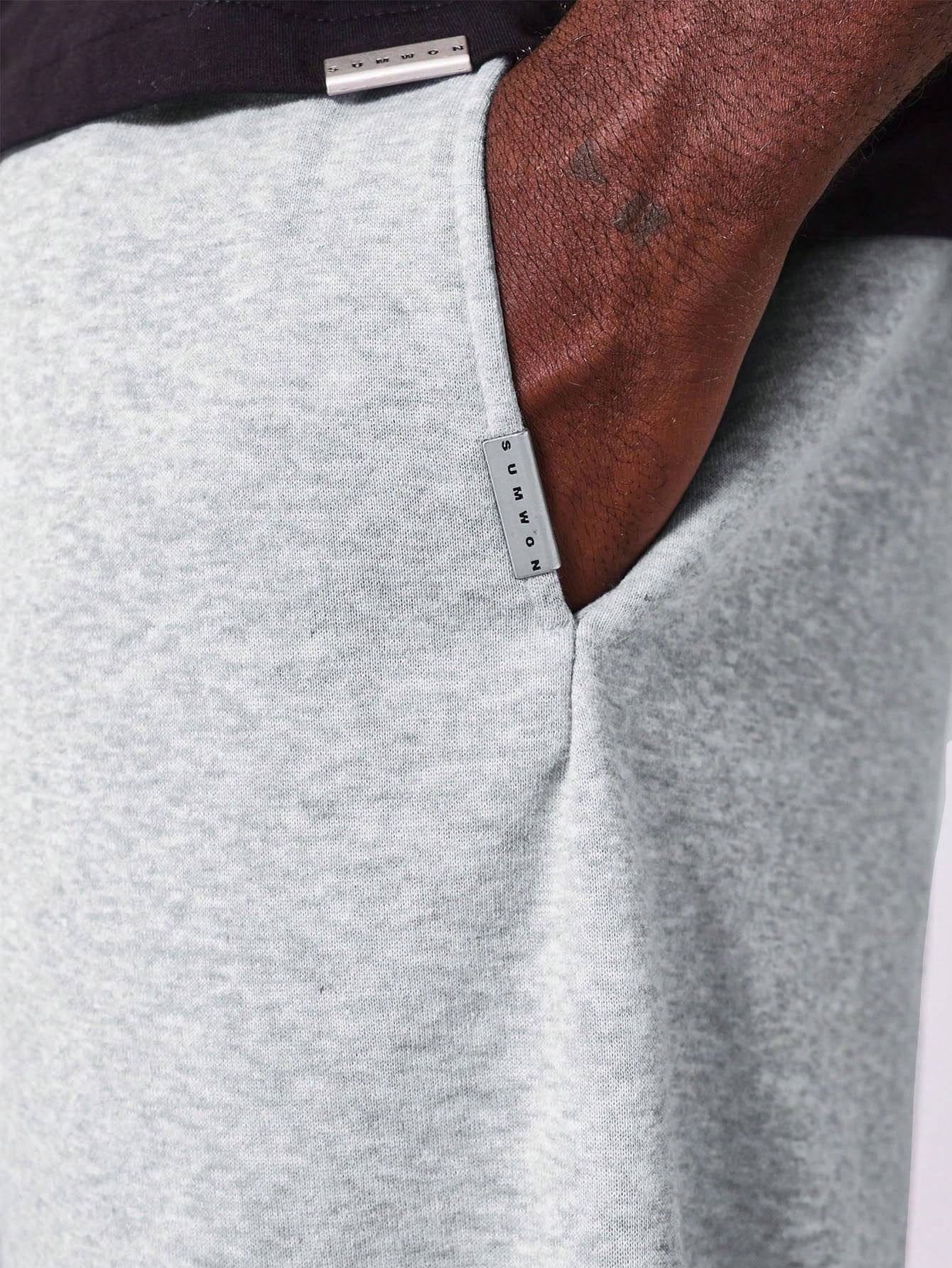 Basis grijze joggingbroek met rechte pasvorm en verlaagd kruis voor mannen Grijs / M