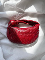 Vlechtknoop Neplederen Mini Tas Met Geweven Ontwerp En Gedraaide Handgreep Voor Elegante En Moderne Stijl
